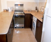 Dark colour Kitchen Colour with beige marble in Makadi