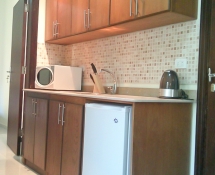 Medium colour Kitchen Colour with beige marble in TIba